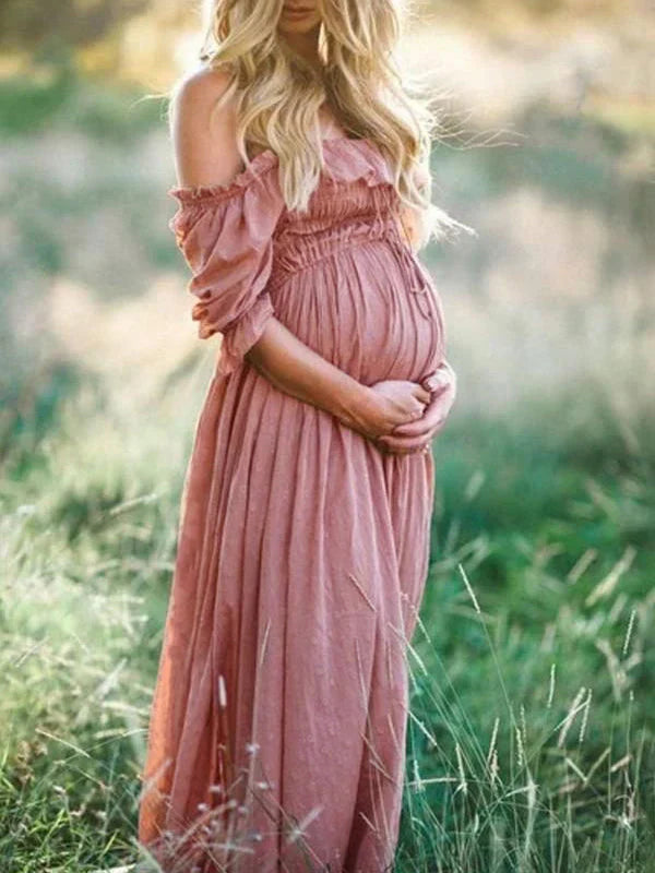 Stylish off-shoulder maxi maternity dress for women, a comfortable flowy option for special occasion pregnancy wear.