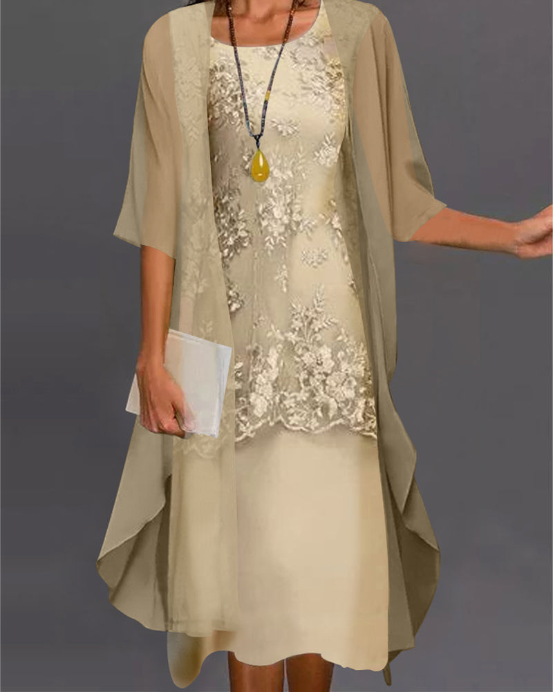 Elegant women's flowy smock dress with delicate lace patchwork, 3/4 sleeves, and knee-length hem, perfect for spring/summer.