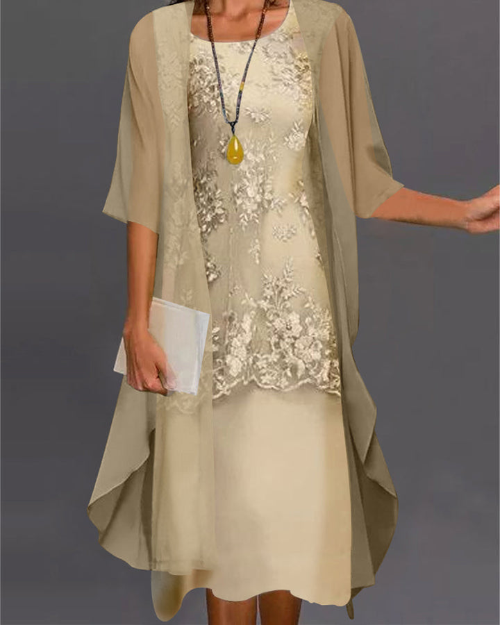 Elegant women's flowy smock dress with delicate lace patchwork, 3/4 sleeves, and knee-length hem, perfect for spring/summer.