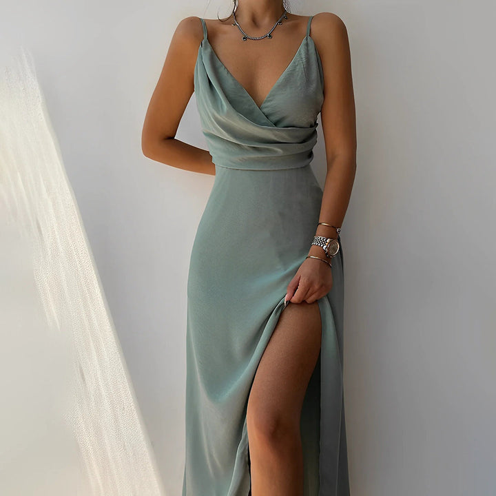 Women's elegant maxi dress with a sophisticated thigh slit, ideal for formal parties & special events.