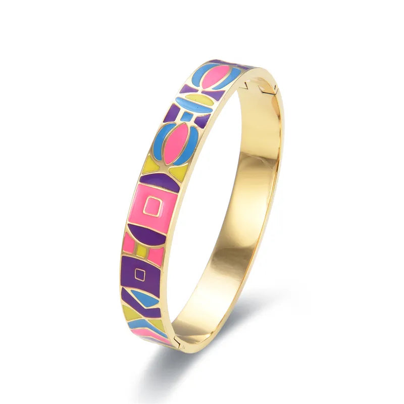 Elegant women's gold charm geode cuff bracelet, a modern fashion accessory with unique geode stone.