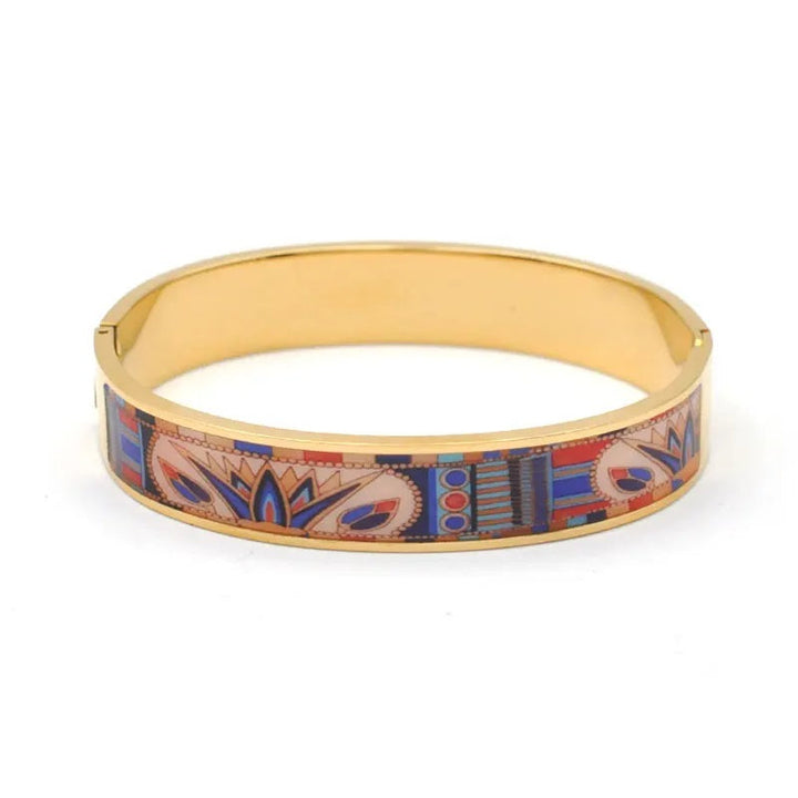Elegant women's gold charm geode cuff bracelet, featuring a unique natural geode, a fashionable accessory.