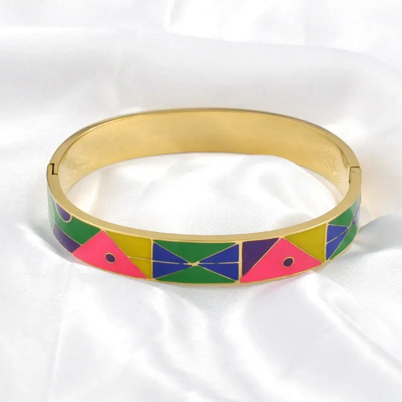 Elegant women's gold charm geode cuff bracelet. A chic and modern jewellery piece, perfect for her.