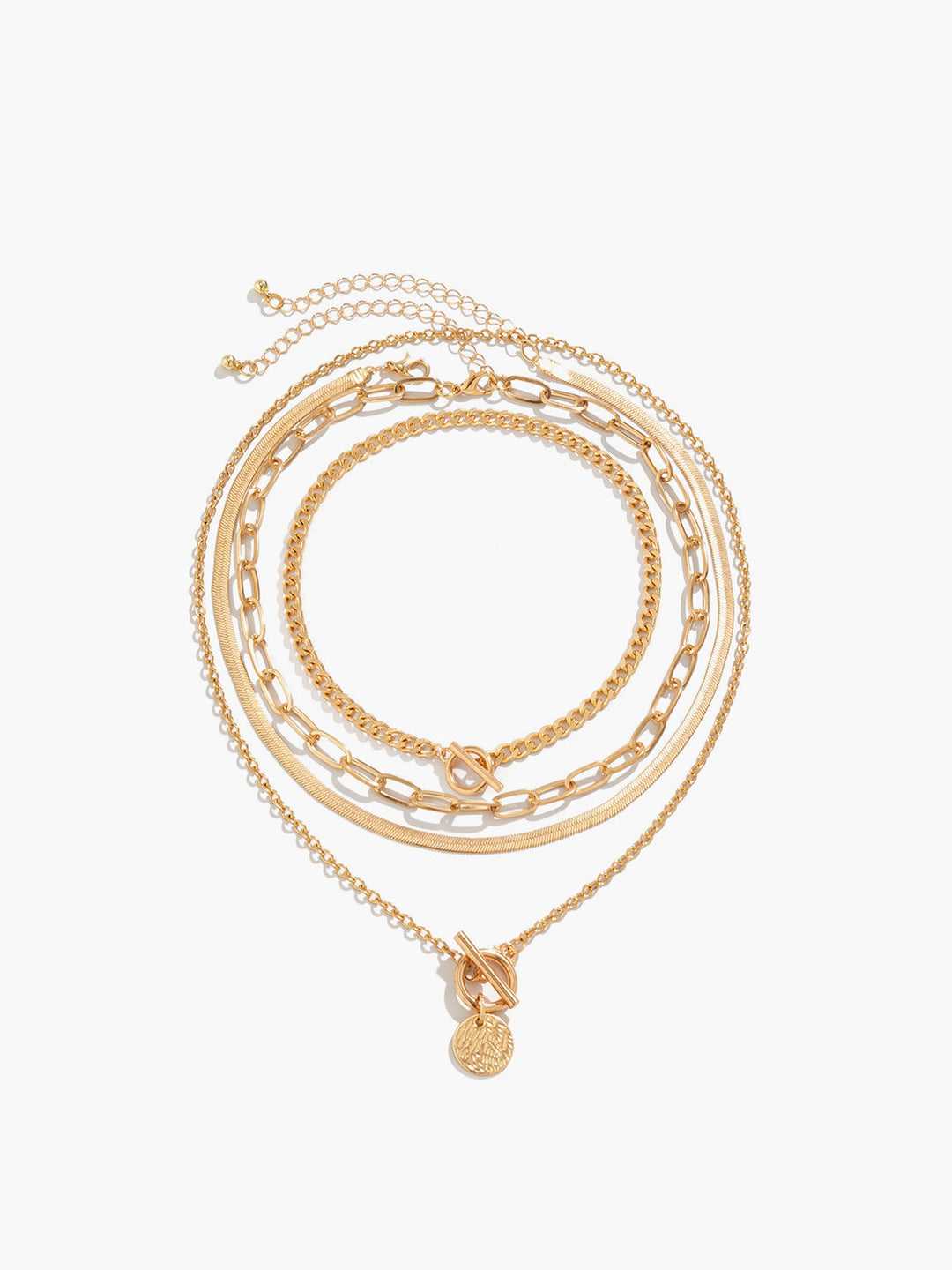 Shining gold layered pendant necklace set for women. Fashionable & elegant jewelry accessory with unique pendants.