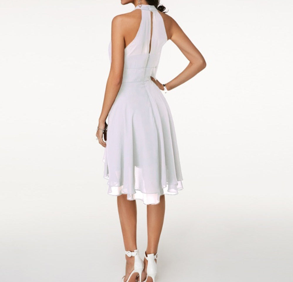 Sophisticated women's halter midi dress, ideal for cocktail parties and special events.