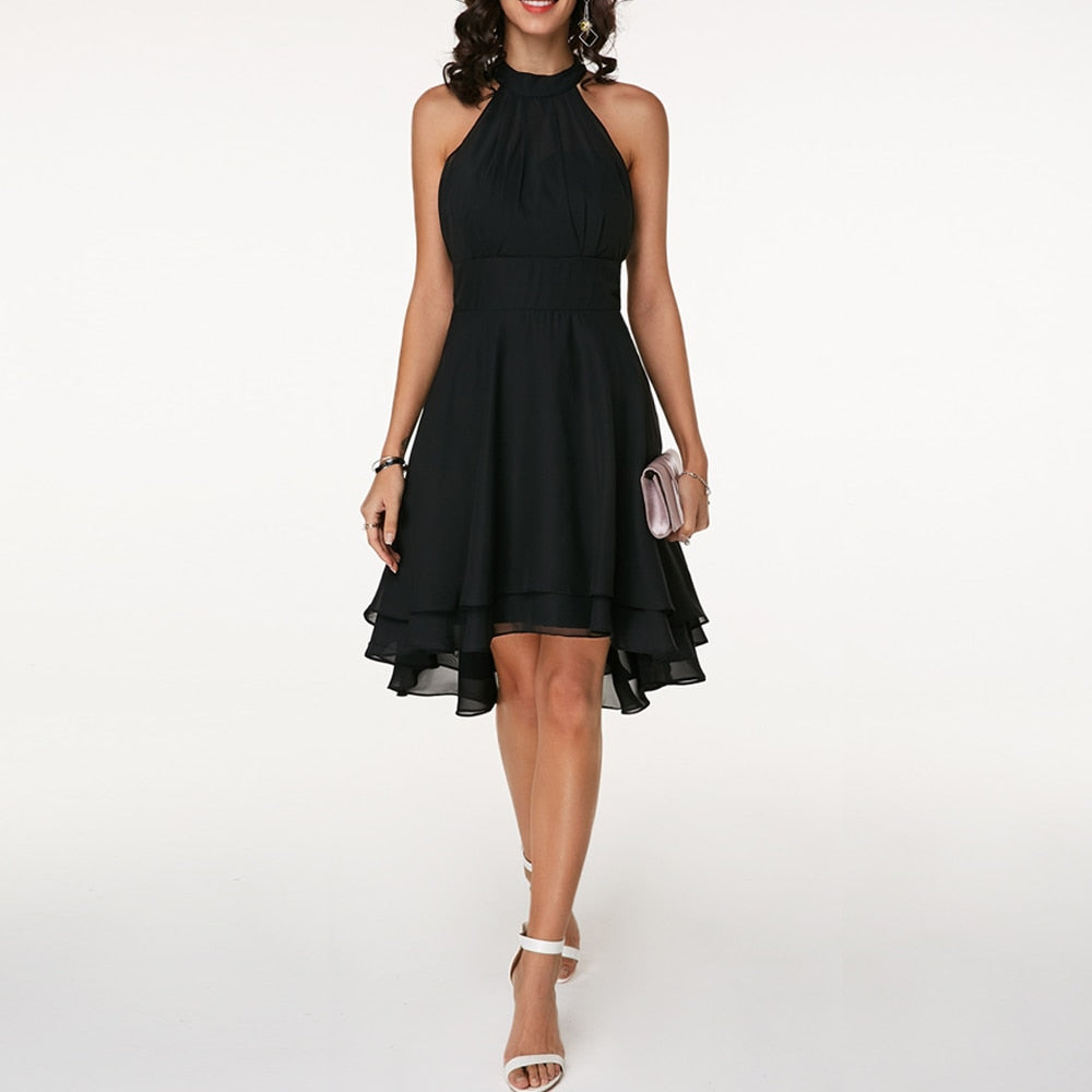 Elegant women's sleeveless midi dress, a flattering halter neck style for parties.