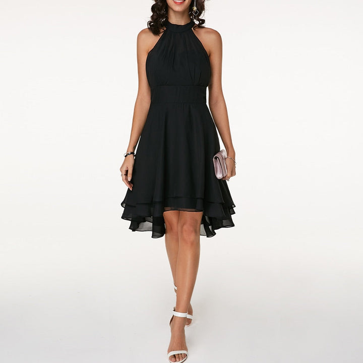 Elegant women's sleeveless midi dress, a flattering halter neck style for parties.