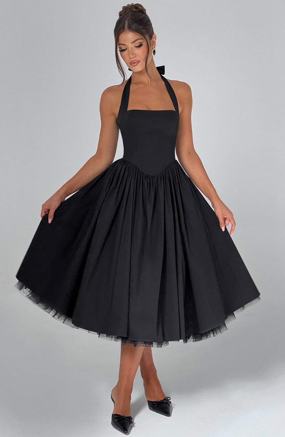 Premium elegant halter midi dress for women, a sophisticated and timeless choice for any formal event or wedding.