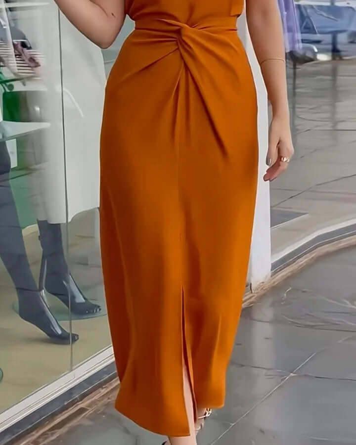 Chic women's summer halter midi dress with unique twist knot front, a perfect elegant party or cocktail outfit.