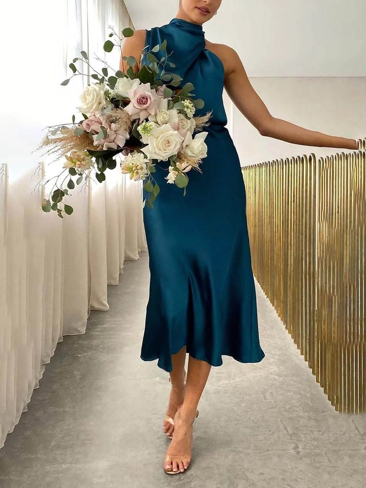 Sophisticated halter neck bridesmaid midi dress, ideal for wedding guests, cocktail parties & formal events.