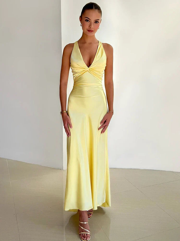 Elegant women's halter neck satin maxi dress, perfect as an evening gown for formal events or special occasions.