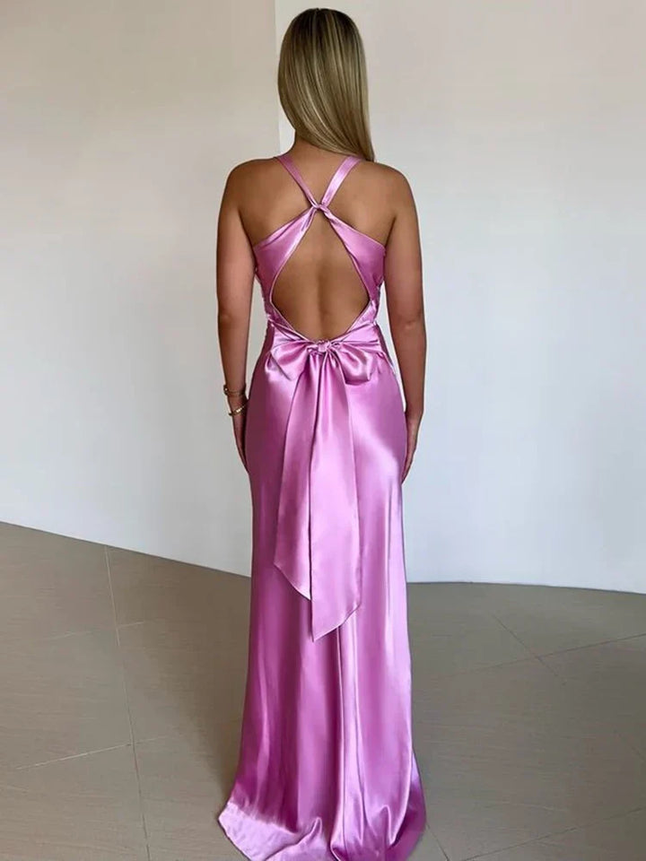 Formal women's long halter neck satin dress, an elegant choice for proms, parties, and evening events.