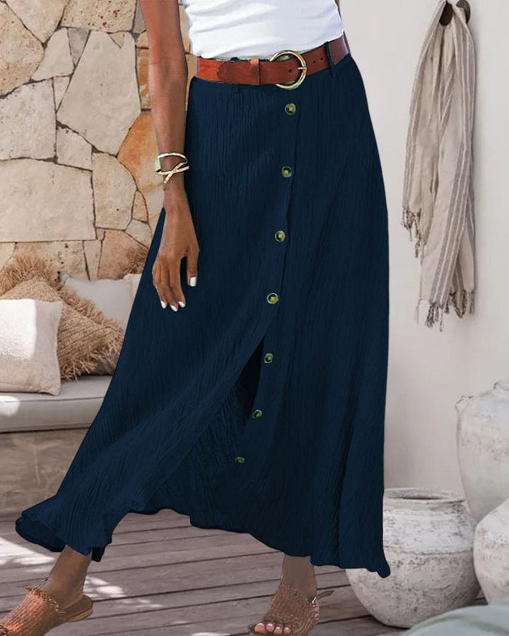Women's versatile high-waist long skirt with a graceful flow, ideal for elegant everyday wear.