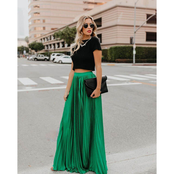Stylish women's high waist pleated maxi skirt, a long flowy design ideal for elegant versatile summer fashion.