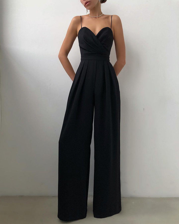 Elegant women's high-waist spaghetti strap jumpsuit. Chic, comfortable fashion for summer parties.