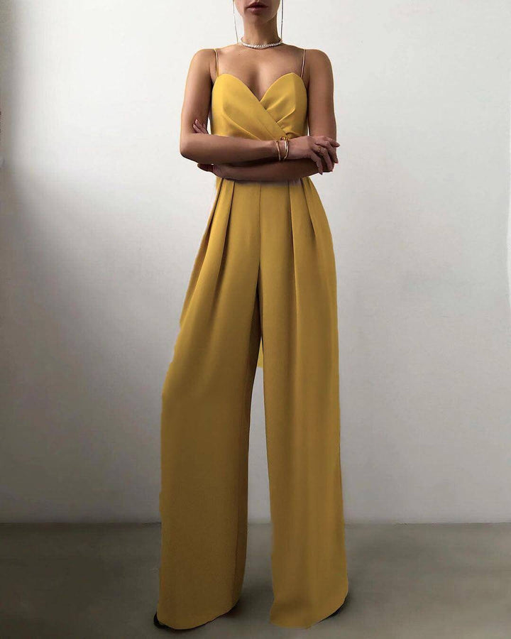 Full-length shot of a women's elegant high-waist spaghetti strap jumpsuit, ideal for chic summer fashion.