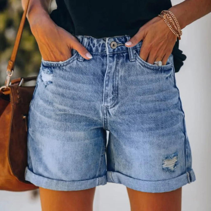 Elegant women's high waist summer shorts in a comfortable blue fabric, perfect for warm weather fashion.