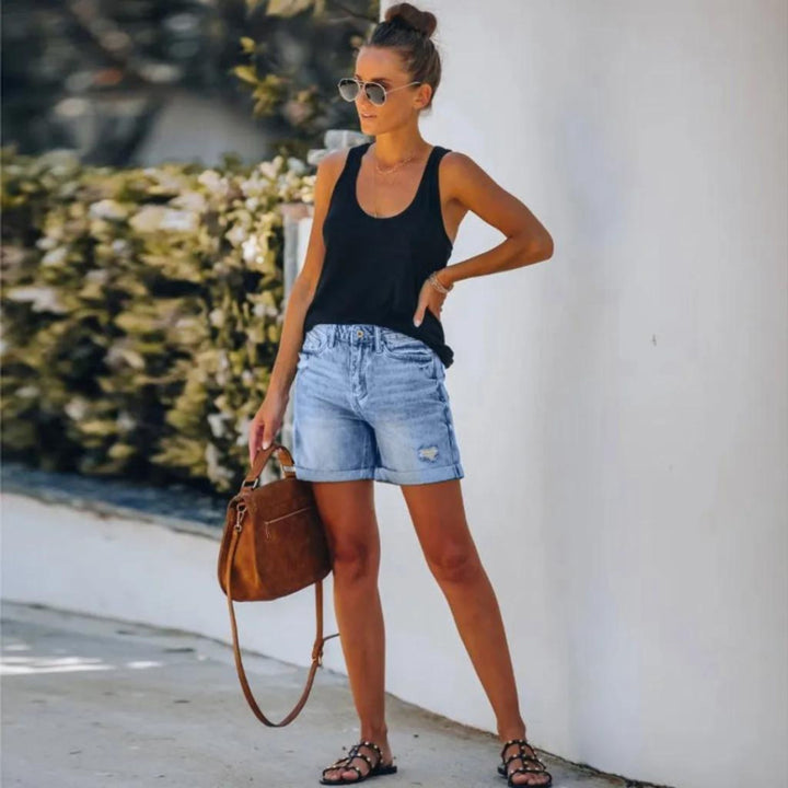 Stylish blue high-waist summer shorts for women, offering both elegant comfort and a flattering fit.