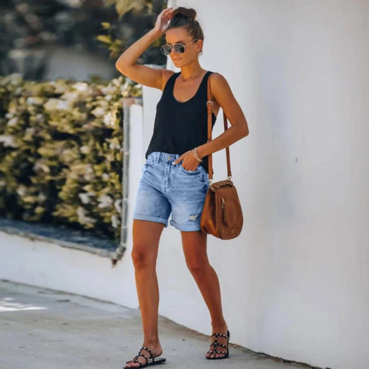 Flattering ladies high-waist shorts, offering elegant comfort for casual summer fashion and warm weather.