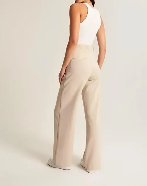 Elegant women's high-waist wide-leg trousers with pleated front, ideal for sophisticated business casual outfits.