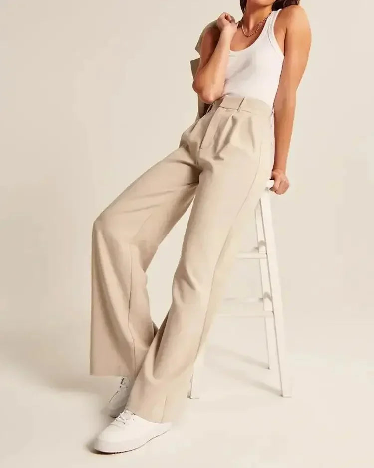 Women's high-waist wool blend wide-leg trousers with a chic pleated front, offering a luxurious and sophisticated feel.