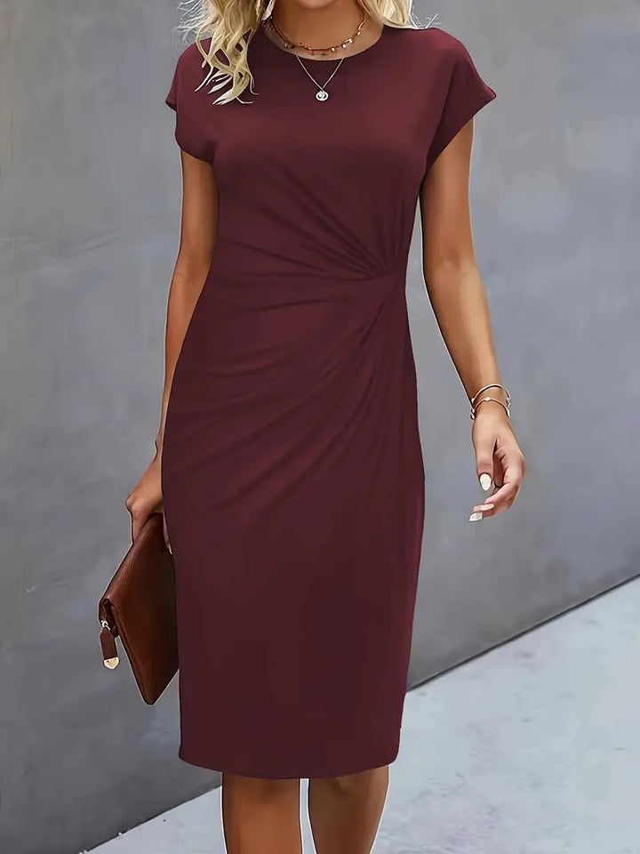 Women's exquisite knee-length sheath dress, solid color, featuring a beautifully ruched waist.