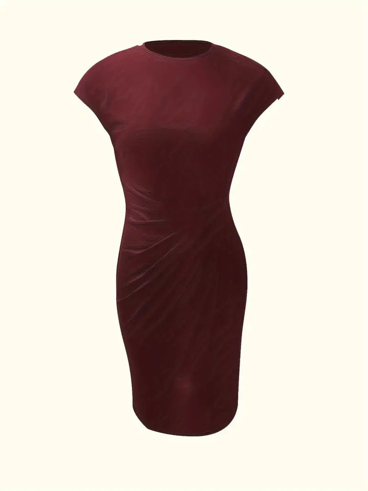 Stylish knee-length women's dress, sheath silhouette, with a figure-enhancing ruched waist detail.