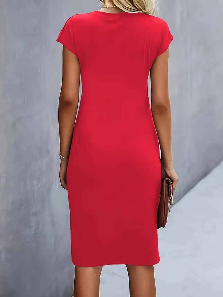 Versatile spring/summer women's knee-length sheath dress, with a comfortable and elegant ruched waist.
