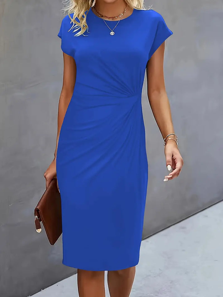 Classic women's knee-length sheath dress, versatile with a flattering ruched waist for any occasion.