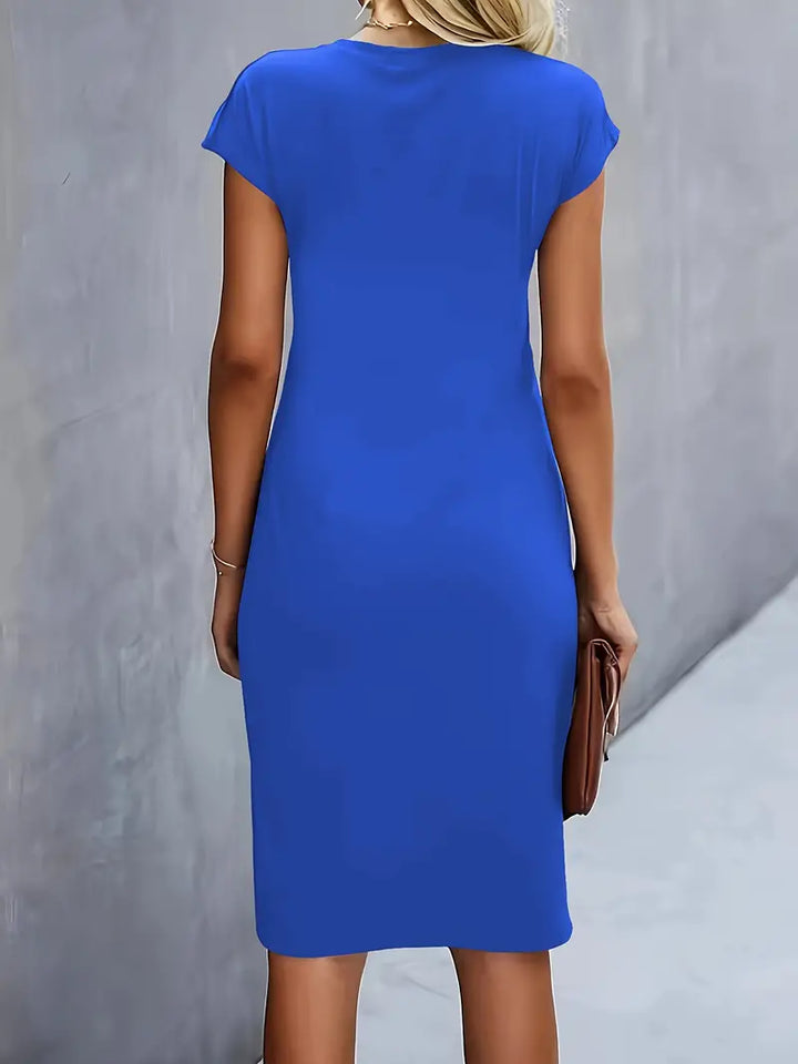 Formal women's knee-length sheath dress, solid, with an elegant ruched waist for professional wear.