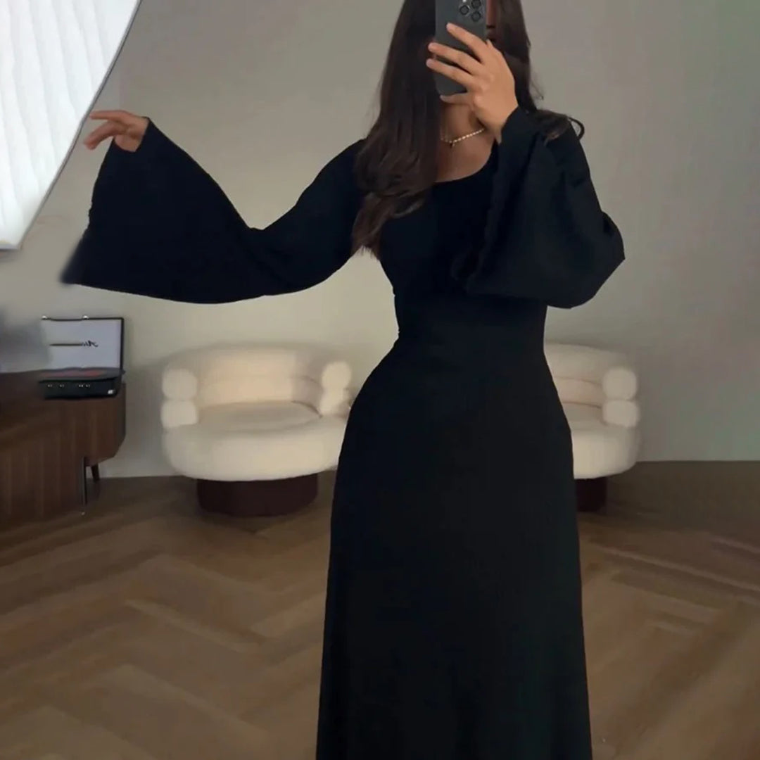 Graceful women's long sleeve knit maxi dress, ideal for achieving a casual chic and comfortably elegant look.