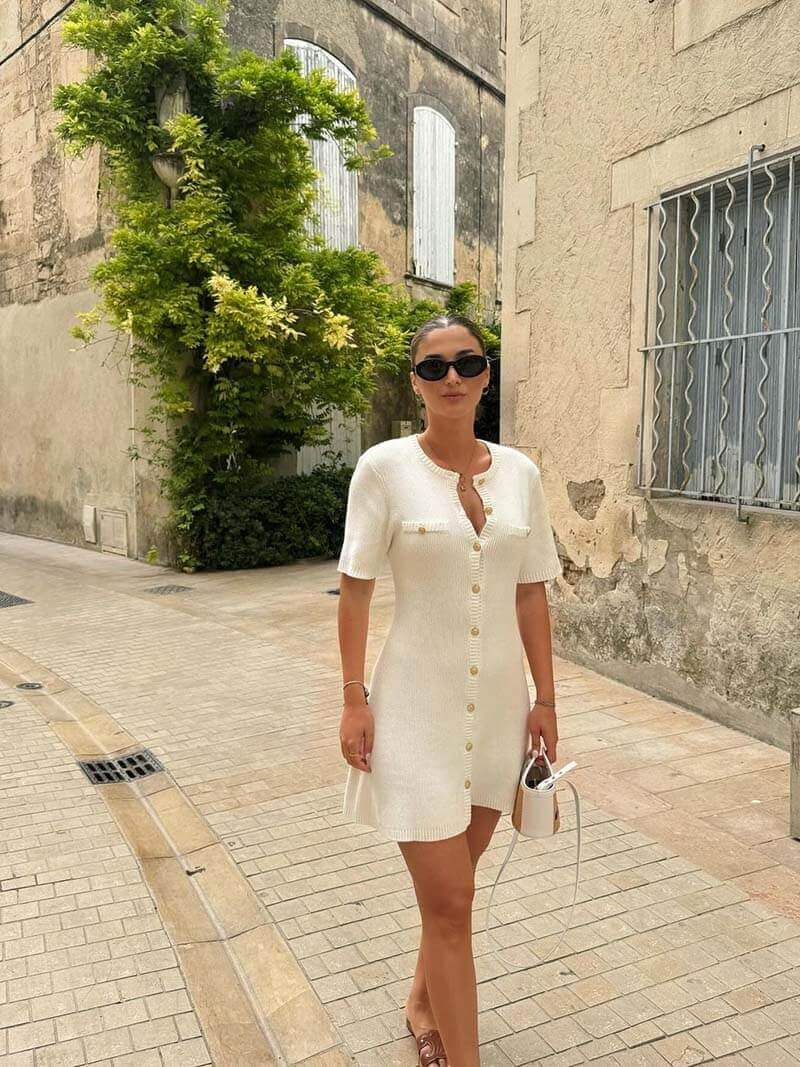 Elegant women's knitted button-down dress. Comfortable & versatile, perfect for casual or dressed-up styles.