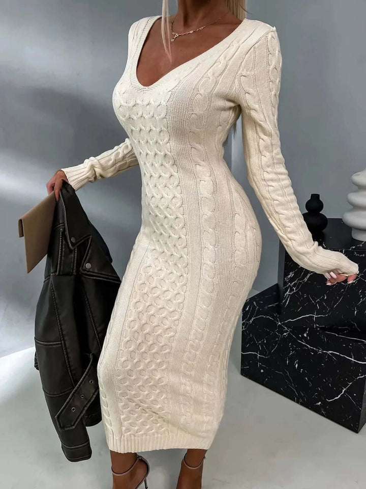 Stylish women's elegant knitted dress, showcasing a delicate lace back design for a sophisticated look.