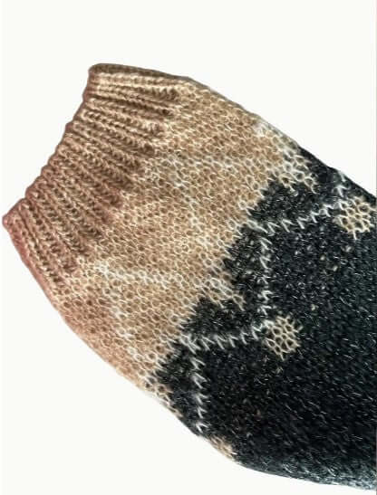 Classic women's elegant knitted round neck sweater. Cozy long sleeve winter fashion staple.