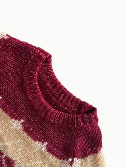Warm women's elegant knitted round neck sweater, a cozy long sleeve top for cold weather.
