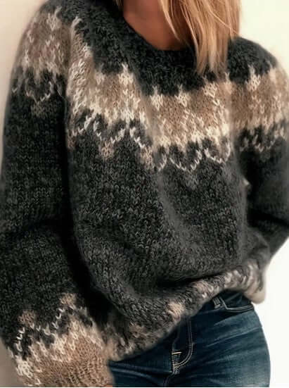 Cozy women's knitted round neck sweater, ideal winter apparel. Versatile long sleeve top.