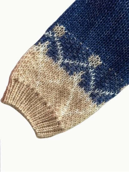 Fall fashion women's knitted round neck sweater. Elegant, cozy long sleeve winter apparel.