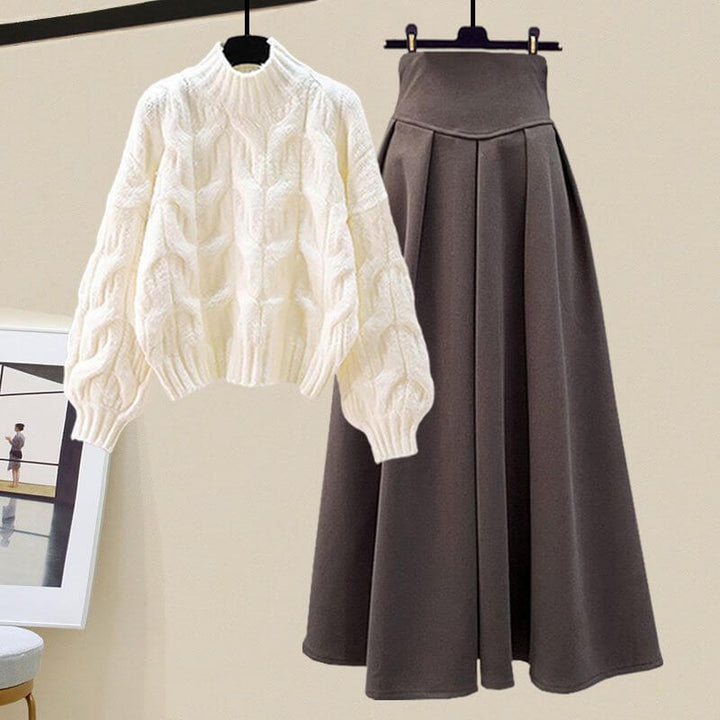Stylish women's knitted sweater and pleated midi skirt set, perfect for elegant fall & winter outfits.