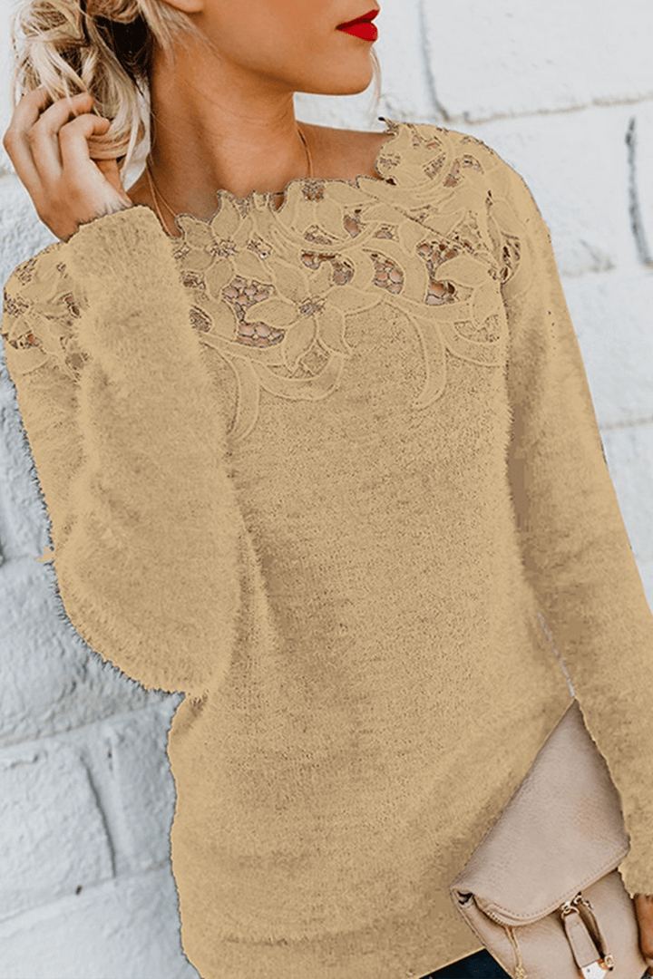 Stylish women's long sleeve knit top with elegant lace detailing, a fashionable and warm winter sweater.