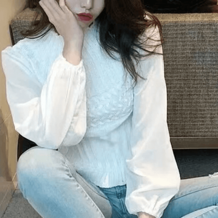 Fashionable women's knitted vest, featuring exquisite sheer sleeves for a refined look.