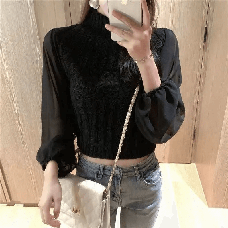 Women's chic winter sweater vest with elegant sheer sleeves & comfortable knit.