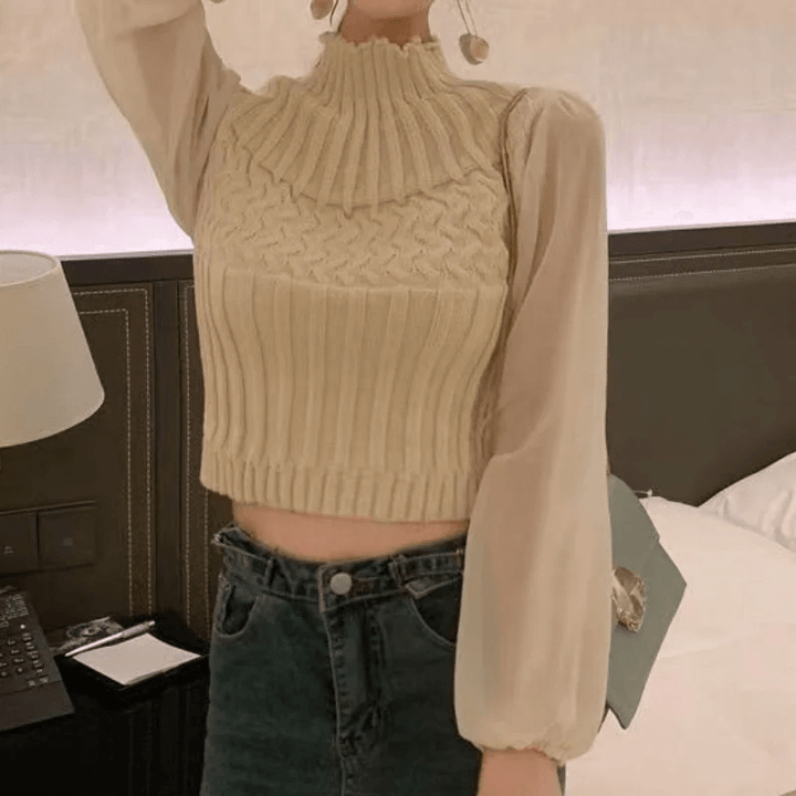 Elegant women's sheer sleeve knitted vest, combining comfort with chic style.