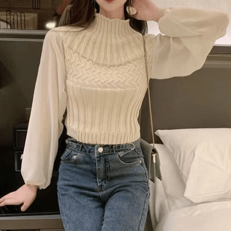 Versatile women's knitted vest with sheer sleeves, a chic fashion statement for any occasion.
