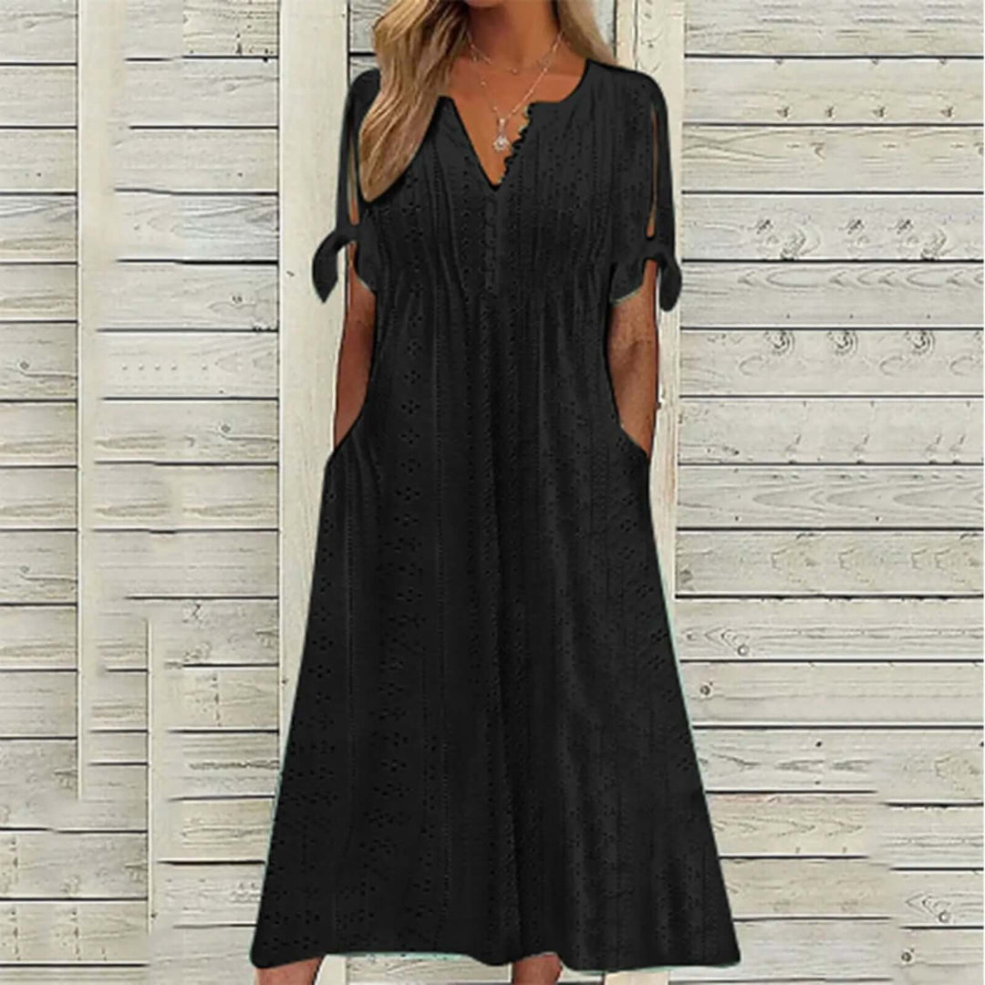 Stylish polyester lace midi dress for women, offering a comfortable and breathable fit for effortless summer fashion.