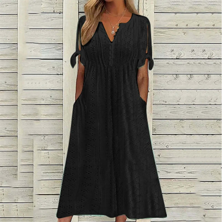 Stylish polyester lace midi dress for women, offering a comfortable and breathable fit for effortless summer fashion.
