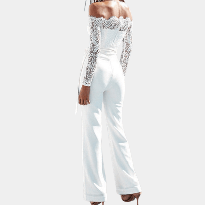 Stylish women's off-shoulder jumpsuit with delicate lace details. Ideal for fashion-forward special occasion wear.
