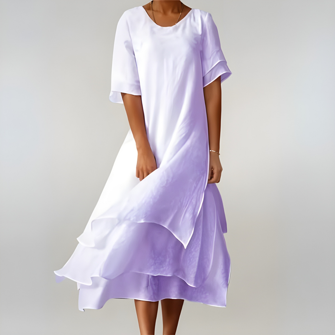 Ladies' elegant maxi dress with a lightweight, flowy design. Perfect for comfortable summer, beach, or vacation style.