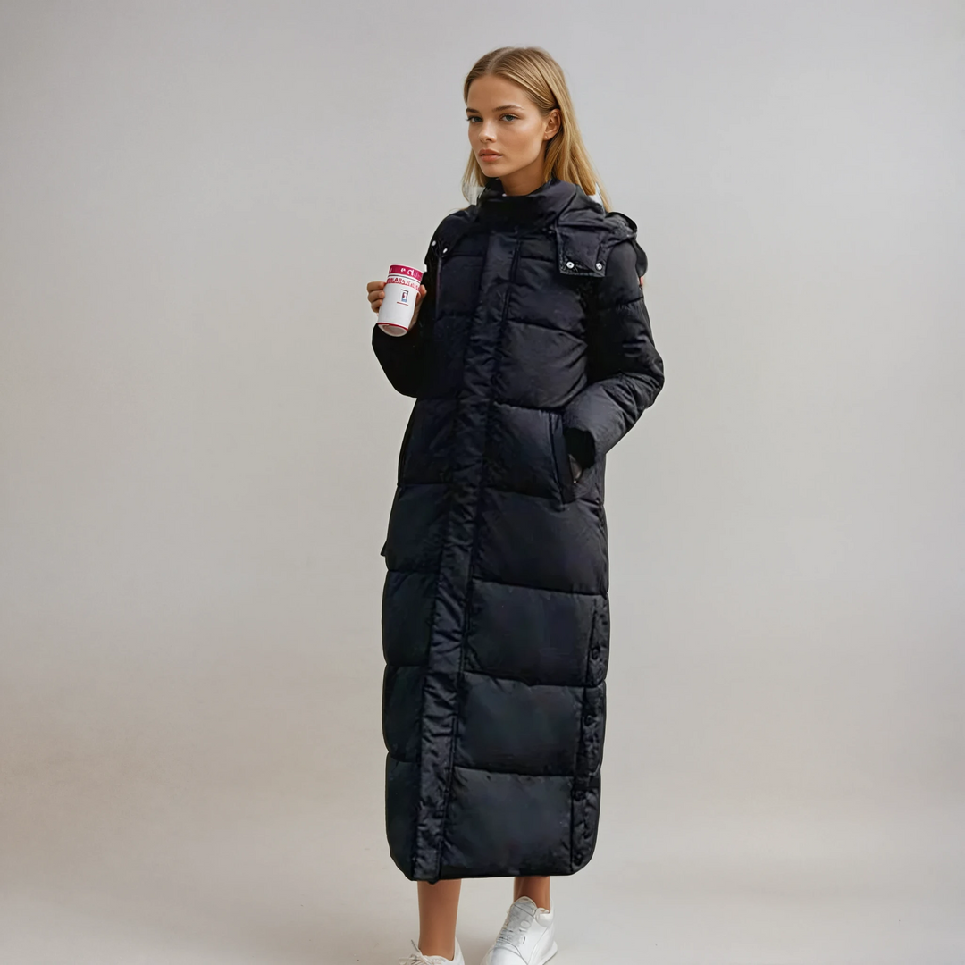 Stylish black women's long puffer coat, perfect for winter warmth and elegant cold weather outerwear. Cozy & chic.