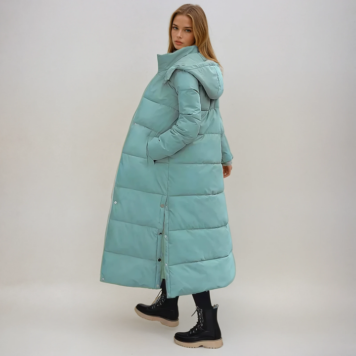 Turquoise women's long puffer coat, a warm and cozy winter outerwear jacket for elegant cold weather fashion.