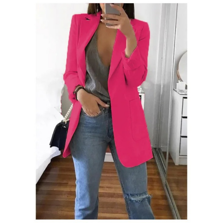 Versatile long women's blazer, ideal for elegant business casual outfits & chic ladies fashion outerwear.